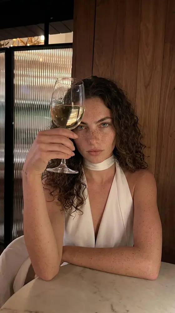 The same synthetic character in a new scene, wardrobe, and light