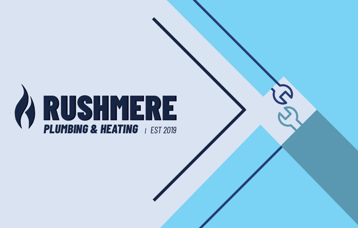 Rushmere business card front: flat navy wordmark and flame on an ice-blue geometric composition with outlined wrenches
